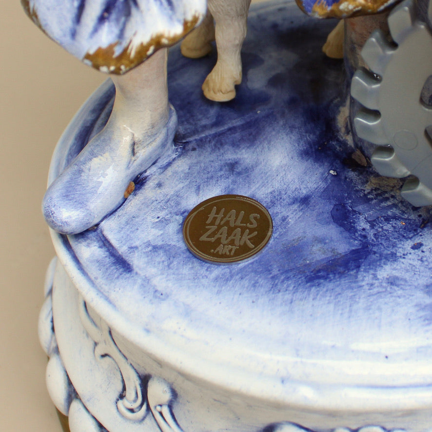 Werk 32. Jardinier in oude stolp Ø25X58cm